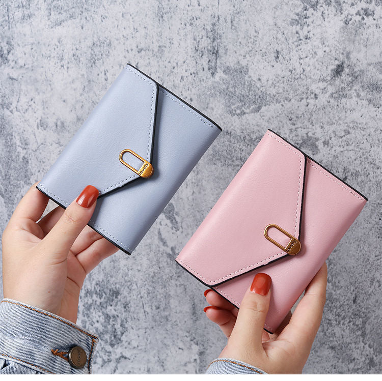 Petit portefeuille à rabat pour femme