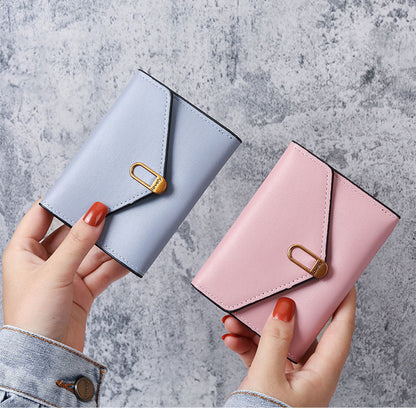 Petit portefeuille à rabat pour femme